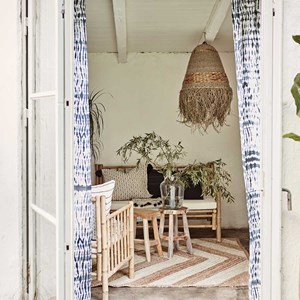 Tabouret rond en bois de teck naturel