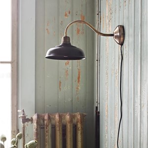 Applique en métal noir et doré antique