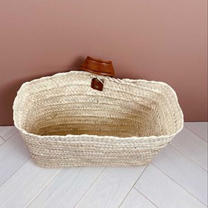 Panier à suspendre en palmier tressé et