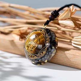 Pendentif orgonite merkaba œil de tigre